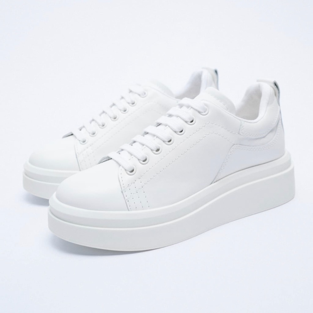 Athletic white sneakers
